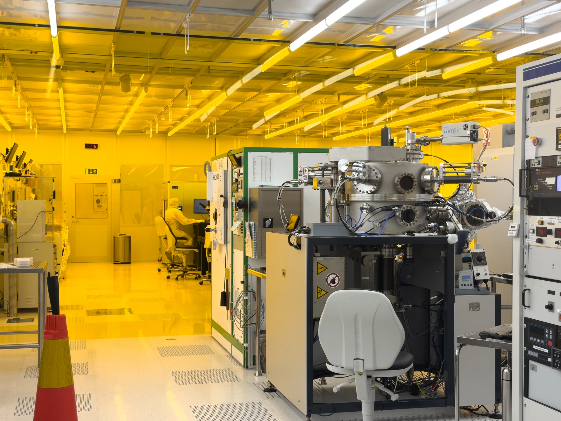 Researcher working with nanofabrication equipment at Chalmers